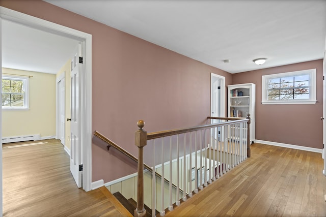 15 Maple Ln, Brookfield, CT 06804 - hall featuring hardwood / wood-style floors, baseboards, an upstairs landing, and a baseboard radiator