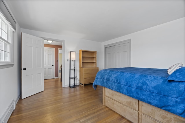 15 Maple Ln, Brookfield, CT 06804 - bedroom with baseboards, wood finished floors, and a closet