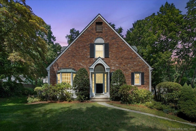 127 Richmond Hill Rd, New Canaan, CT 06840 - view of front of house with a front lawn and brick siding