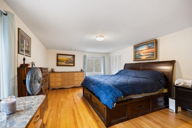 bedroom with light wood finished floors