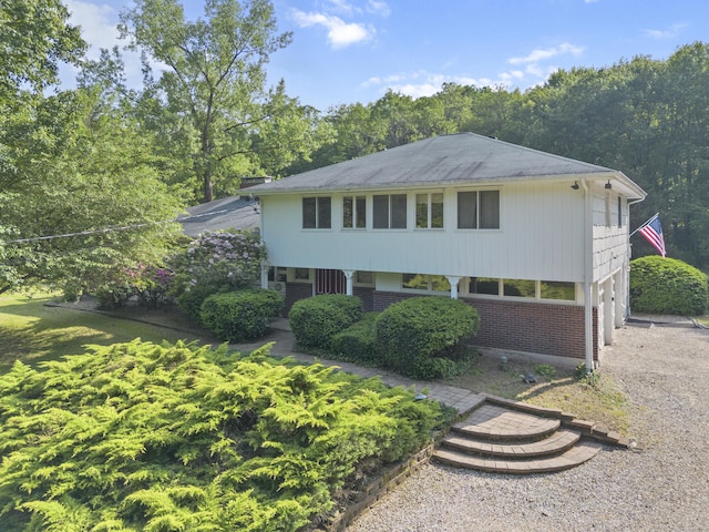 47 Notch Rd, Simsbury, CT 06092 - view of front of home with brick siding