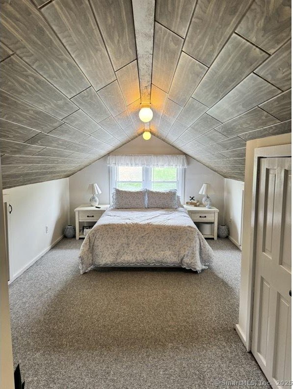 66 Waterview Dr, Newtown, CT 06482 - carpeted bedroom with vaulted ceiling, baseboards, and wood ceiling