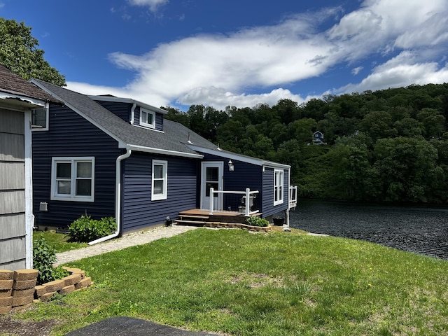 66 Waterview Dr, Newtown, CT 06482 - view of front facade featuring a front lawn and a shingled roof