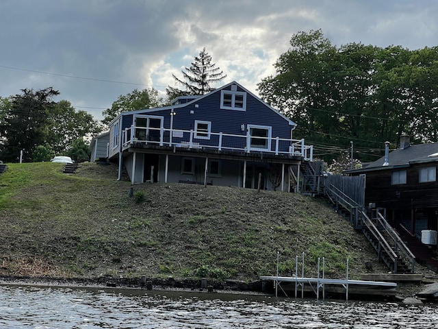 66 Waterview Dr, Newtown, CT 06482 - rear view of property with stairway and a deck with water view