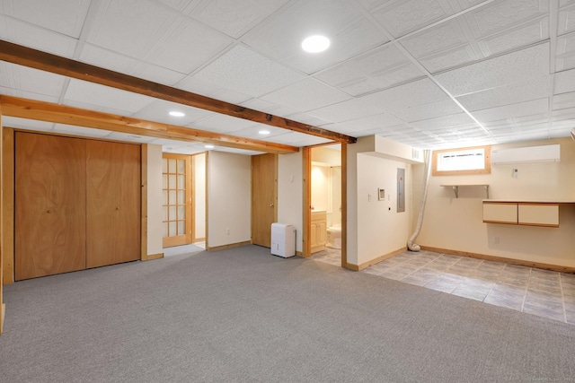 below grade area featuring baseboards, recessed lighting, and light carpet