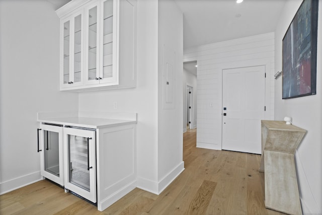 185 Main St Apt 301, East Lyme, CT 06357 - hall with baseboards, light wood-style floors, and beverage cooler