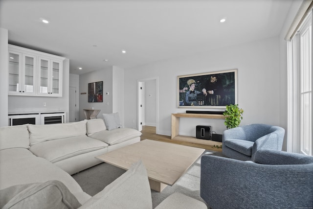 185 Main St Apt 301, East Lyme, CT 06357 - living room featuring a bar, recessed lighting, baseboards, and wood finished floors