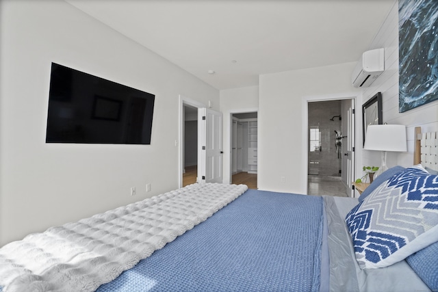 185 Main St Apt 301, East Lyme, CT 06357 - bedroom with ensuite bathroom, a wall mounted air conditioner, and a walk in closet
