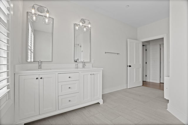 185 Main St Apt 301, East Lyme, CT 06357 - full bath with double vanity, baseboards, and a sink