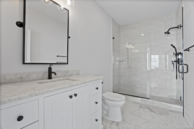 185 Main St Apt 301, East Lyme, CT 06357 - bathroom with vanity, marble finish floor, a stall shower, and toilet