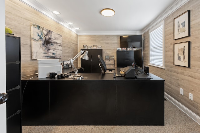 office space with baseboards, wooden walls, and ornamental molding