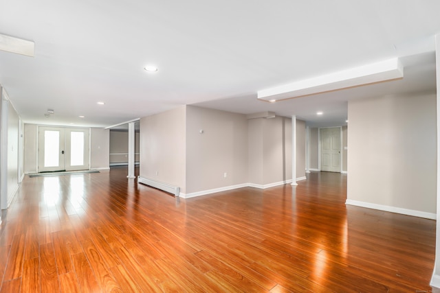 73A Long Meadow Hill Rd, Brookfield, CT 06804 - unfurnished living room featuring a baseboard heating unit, light wood-style flooring, baseboards, recessed lighting, and a baseboard radiator
