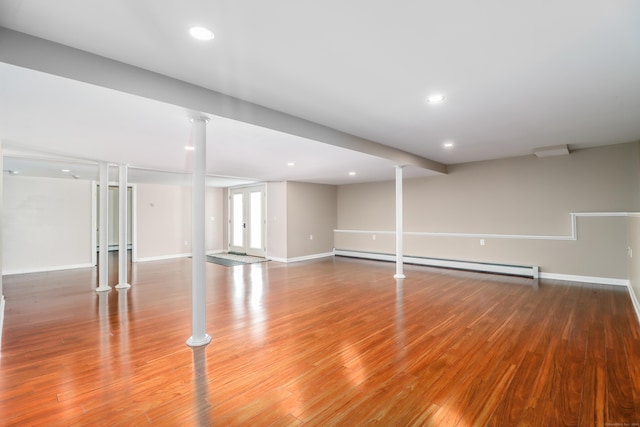 73A Long Meadow Hill Rd, Brookfield, CT 06804 - finished basement featuring a baseboard radiator, light wood-style flooring, baseboards, and recessed lighting