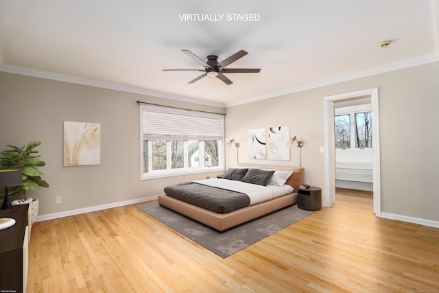 73A Long Meadow Hill Rd, Brookfield, CT 06804 - bedroom featuring multiple windows, wood finished floors, ornamental molding, baseboards, and ceiling fan