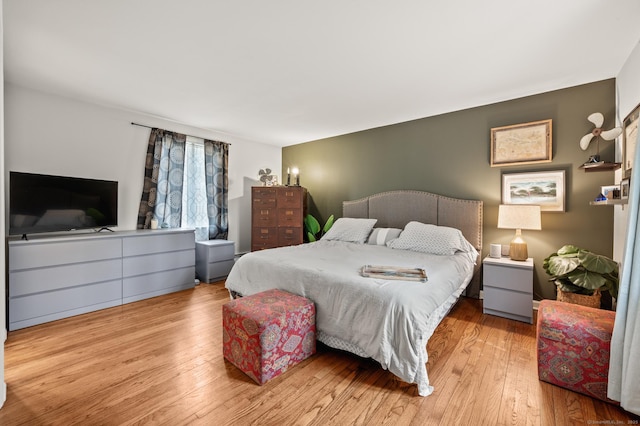 bedroom featuring wood-type flooring