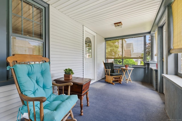 30 Phelps Rd, Manchester, CT 06042 - sunroom featuring carpet flooring and wood walls