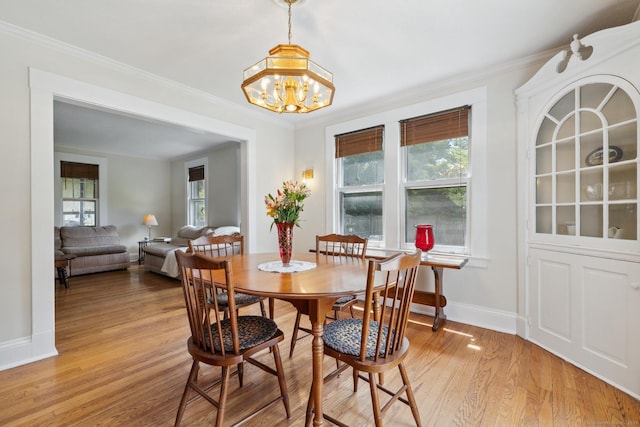 30 Phelps Rd, Manchester, CT 06042 - dining room with a chandelier, light wood finished floors, and ornamental molding