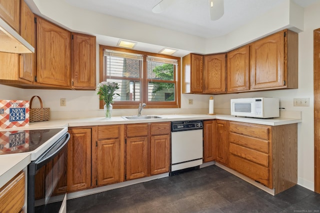 30 Phelps Rd, Manchester, CT 06042 - kitchen with white appliances, under cabinet range hood, and brown cabinets