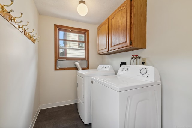 30 Phelps Rd, Manchester, CT 06042 - laundry room featuring cabinet space, washer and clothes dryer, and a textured ceiling