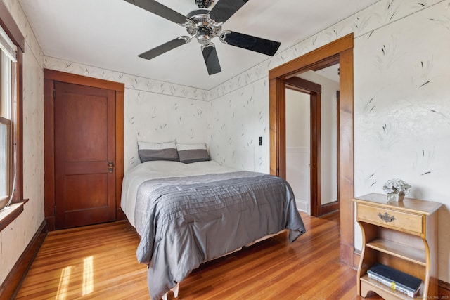 30 Phelps Rd, Manchester, CT 06042 - bedroom with light wood-style floors, wallpapered walls, and a ceiling fan