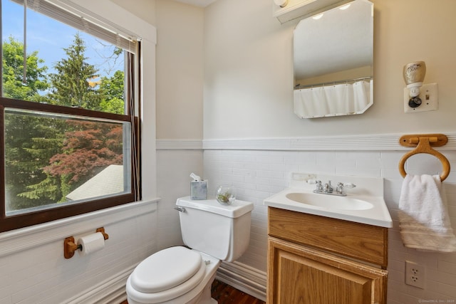 30 Phelps Rd, Manchester, CT 06042 - full bath with vanity, tile walls, and wainscoting