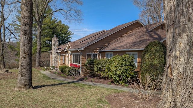 3 Mountain Dr, New Milford, CT 06776 - view of home's exterior featuring a chimney and a yard