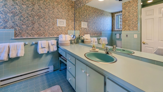 3 Mountain Dr, New Milford, CT 06776 - bathroom with a baseboard radiator, wallpapered walls, wainscoting, and tile walls