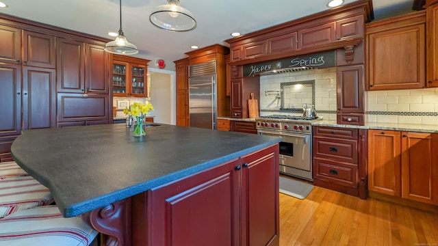 3 Mountain Dr, New Milford, CT 06776 - kitchen with premium appliances, recessed lighting, light wood-style flooring, and backsplash