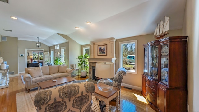 3 Mountain Dr, New Milford, CT 06776 - living room with light wood-style flooring, visible vents, baseboards, and a fireplace