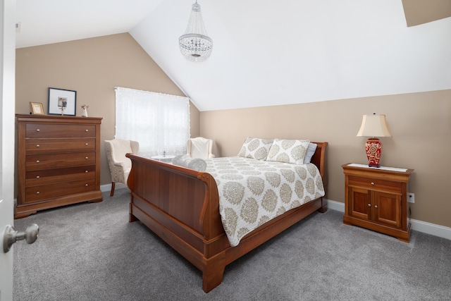 bedroom with baseboards, carpet, and vaulted ceiling