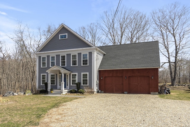 136 Tater Hill Rd, East Haddam, CT 06423 - view of front of property featuring gravel driveway, an attached garage, and a front yard