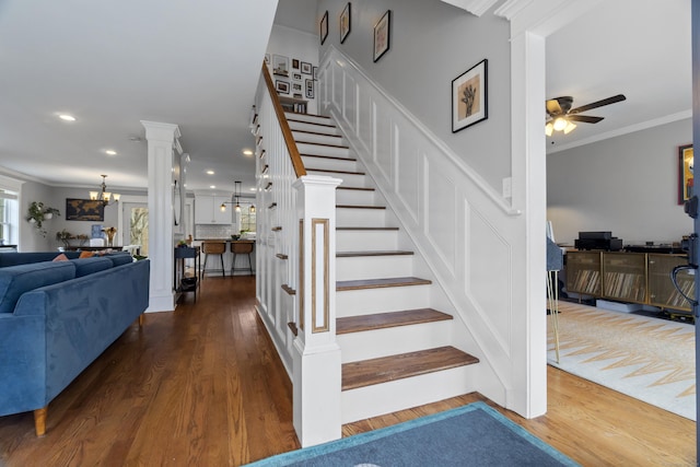 136 Tater Hill Rd, East Haddam, CT 06423 - staircase featuring ornamental molding, wood finished floors, ceiling fan, a chandelier, and recessed lighting