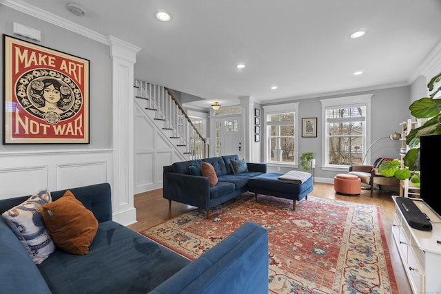 136 Tater Hill Rd, East Haddam, CT 06423 - living room with ornate columns, crown molding, wood finished floors, stairway, and recessed lighting