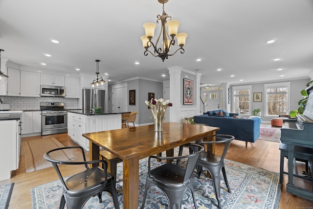 136 Tater Hill Rd, East Haddam, CT 06423 - dining space with crown molding, a chandelier, recessed lighting, and light wood-style floors