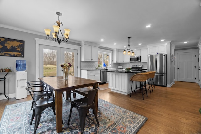 136 Tater Hill Rd, East Haddam, CT 06423 - dining room featuring crown molding, a chandelier, recessed lighting, dark wood-type flooring, and baseboards