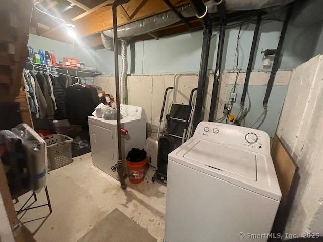 laundry area featuring laundry area and washer / clothes dryer