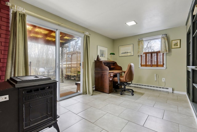 home office featuring a baseboard radiator, light tile patterned floors, and baseboards
