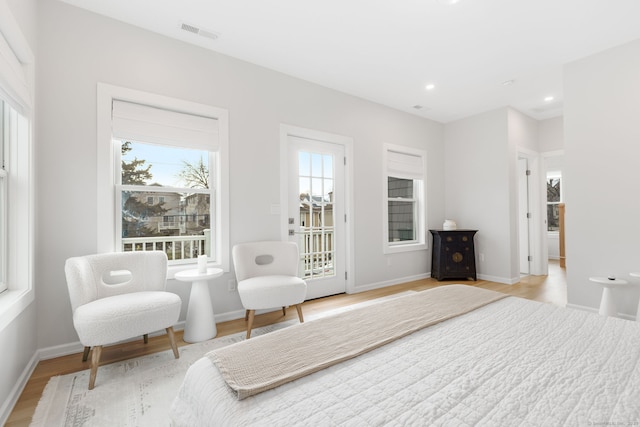 27 Hauser St, Milford, CT 06460 - bedroom with visible vents, multiple windows, recessed lighting, and light wood finished floors