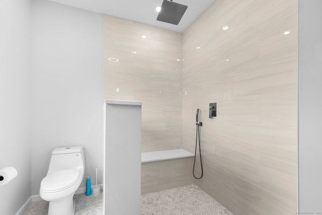 27 Hauser St, Milford, CT 06460 - bathroom with tiled shower, tile patterned flooring, recessed lighting, toilet, and baseboards