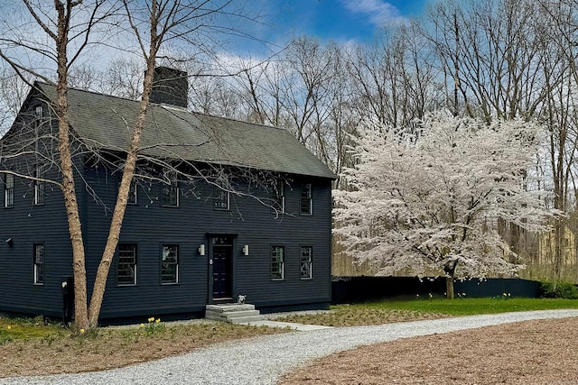 8 Shelter Rock Rd, East Haddam, CT 06423 - view of front facade with a chimney and roof with shingles