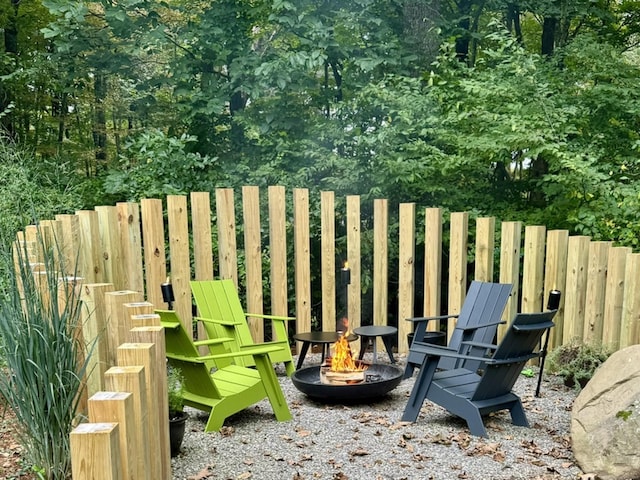8 Shelter Rock Rd, East Haddam, CT 06423 - view of play area with a fire pit and fence