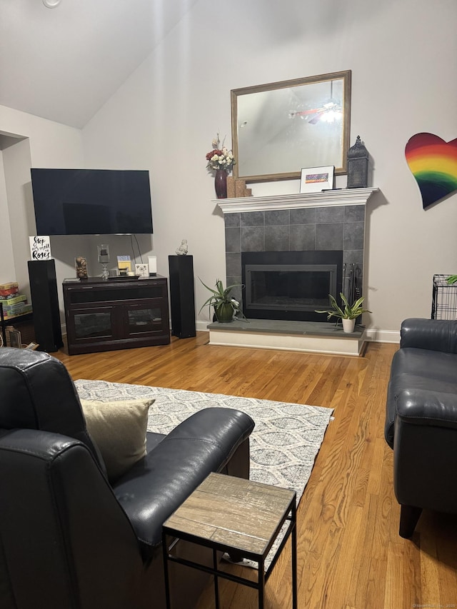 88 Brookfield Rd, Seymour, CT 06483 - living area with lofted ceiling, a fireplace, and wood finished floors