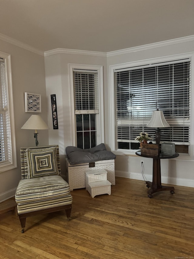 88 Brookfield Rd, Seymour, CT 06483 - living area featuring baseboards, wood finished floors, crown molding, and plenty of natural light
