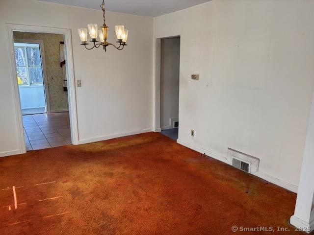 94 Morris St, West Haven, CT 06516 - unfurnished dining area with baseboards, visible vents, carpet, and a notable chandelier