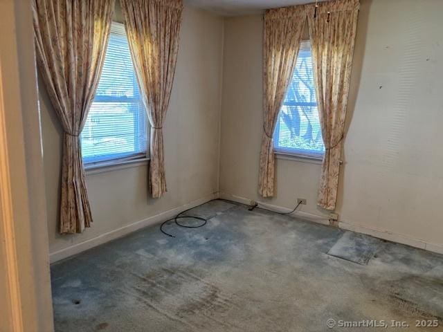 94 Morris St, West Haven, CT 06516 - empty room featuring carpet, baseboards, and plenty of natural light