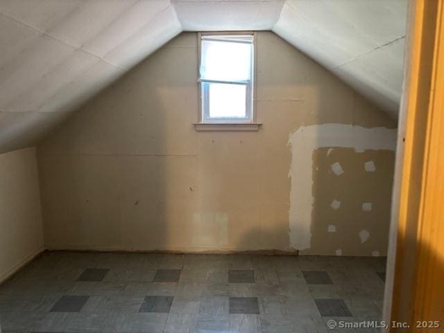 94 Morris St, West Haven, CT 06516 - additional living space with lofted ceiling and tile patterned floors