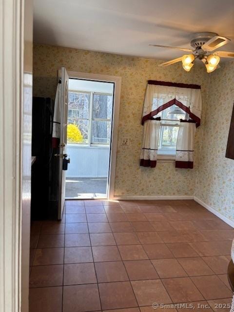94 Morris St, West Haven, CT 06516 - interior space featuring wallpapered walls, baseboards, tile patterned flooring, and ceiling fan