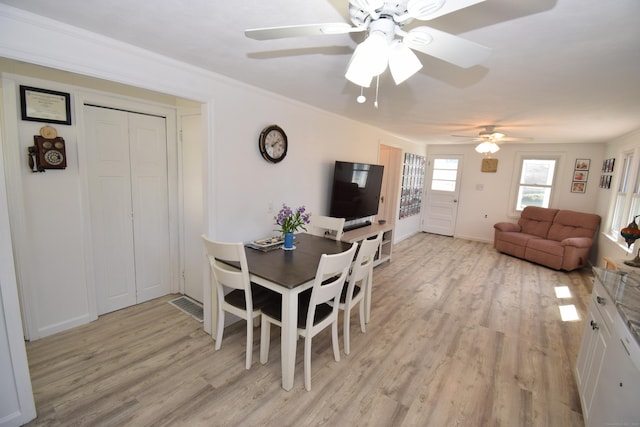5 Hammock Pkwy, Clinton, CT 06413 - dining room featuring light wood-type flooring, a ceiling fan, and baseboards