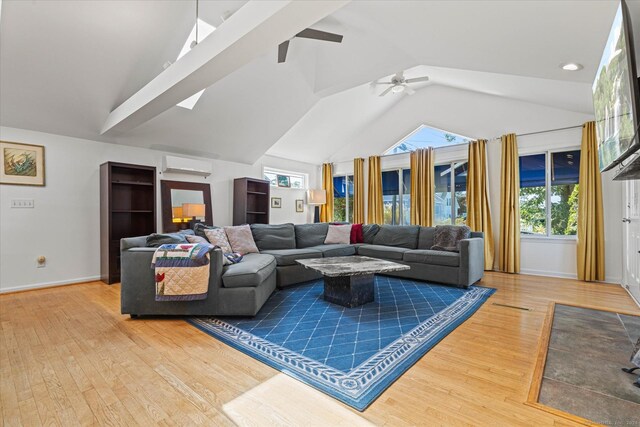 231 Pawson Rd, Branford, CT 06405 - living area featuring lofted ceiling, wood finished floors, ceiling fan, baseboards, and an AC wall unit