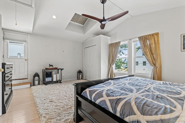231 Pawson Rd, Branford, CT 06405 - bedroom featuring vaulted ceiling, attic access, light wood finished floors, a closet, and ceiling fan
